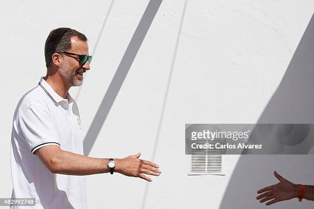 King Felipe VI of Spain arrives at the Royal Nautical Club during the 34th Copa del Rey Mapfre Sailing Cup day 3 on August 5, 2015 in Palma de...