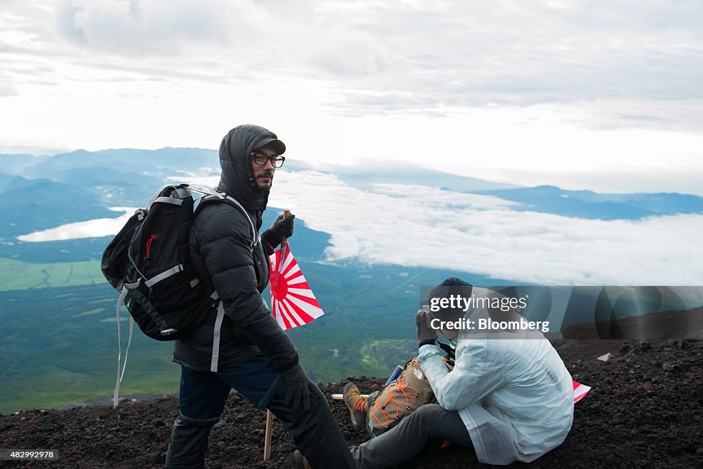 Tourists Climb Mount Fuji