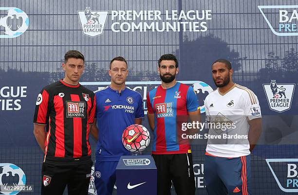 Tommy Elphick of AFC Bournemouth, John Terry of Chelsea FC, Mile Jedinak of Crystal Palace and Ashley Williams of Swansea City AFC pose for a...