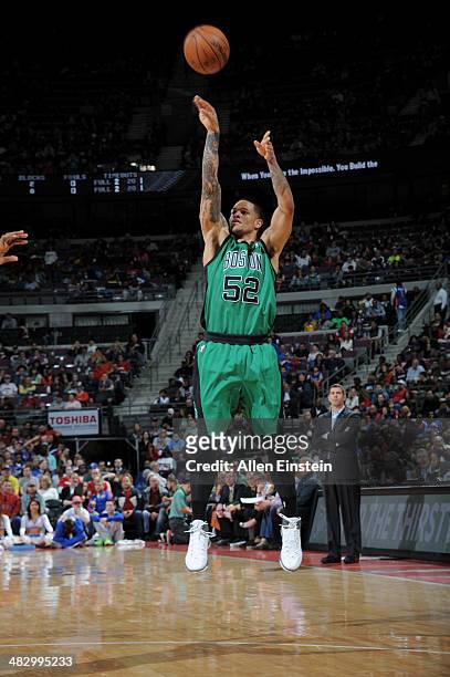 Chris Babb of the Boston Celtics shoots against the Detroit Pistons on April 5, 2014 at The Palace of Auburn Hills in Auburn Hills, Michigan. NOTE TO...