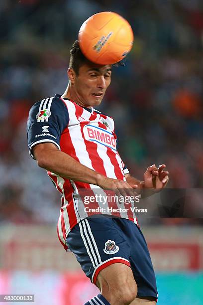 Aldo de Nigris of Chivas heads the ball during a match between Pachuca and Chivas as part of the 14th round Clausura 2014 Liga MX at Hidalgo Stadium...