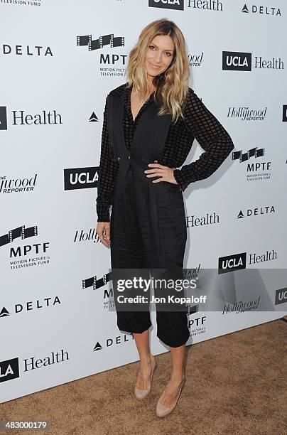 Actress Dawn Olivieri arrives at the MPTF Reel Stories, Real Lives Event at Milk Studios on April 5, 2014 in Los Angeles, California.