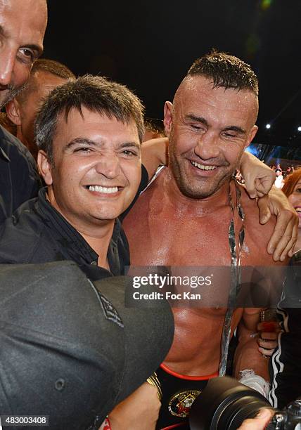 Thomas Langmann and kick boxing champion Jerome Le Banner attend the 'Fight Night 2015' Gala Show at La Citadelle de Saint Tropez on on August 4,...
