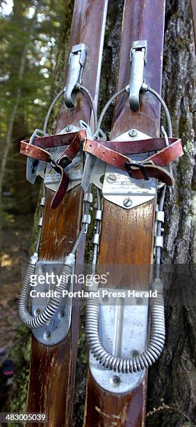 Staff Photo by Gordon Chibroski, Friday, February 17, 2006: Old wooden downhill skis contain "bear trap" bindings that contributed to a few sprained...