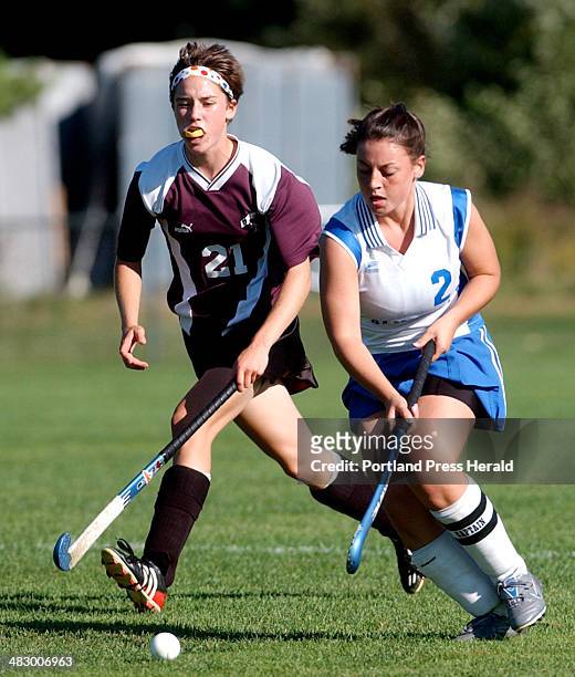 Staff Photo by Shawn Patrick Ouellette, Friday, September 23, 2005: Greely's Julie Fournier,left, and Falmouth's Katrina Costa battle for the ball in...