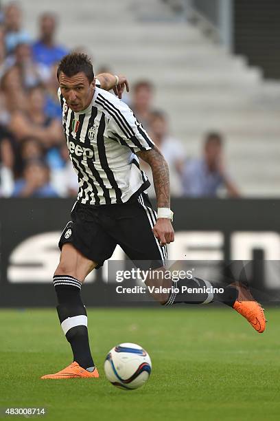 Mario Mandzukic of Juventus FC in action during the preseason friendly match between Olympique de Marseille and Juventus FC at Stade Velodrome on...