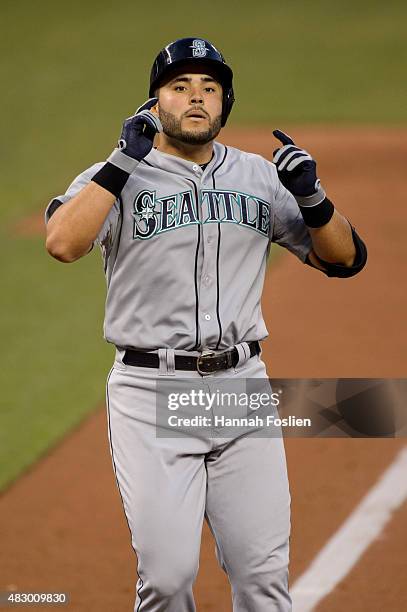 Jesus Montero of the Seattle Mariners celebrates hitting a home run against the Minnesota Twins during the game on July 31, 2015 at Target Field in...