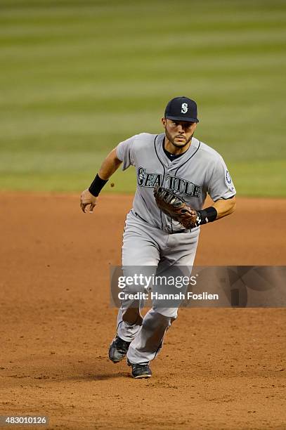 Jesus Montero of the Seattle Mariners makes a play at first base against the Minnesota Twins during the game on July 31, 2015 at Target Field in...