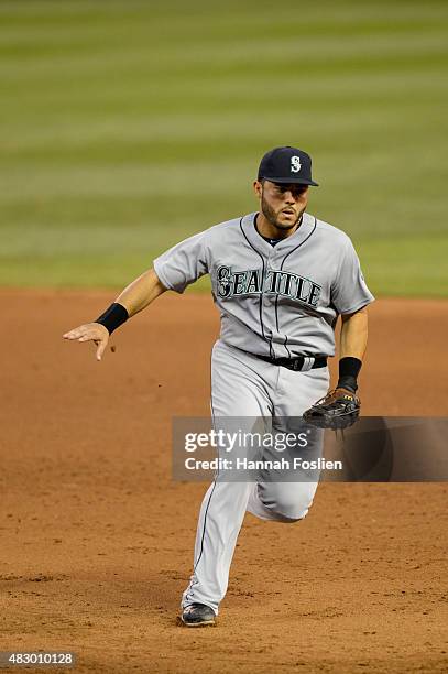 Jesus Montero of the Seattle Mariners makes a play at first base against the Minnesota Twins during the game on July 31, 2015 at Target Field in...