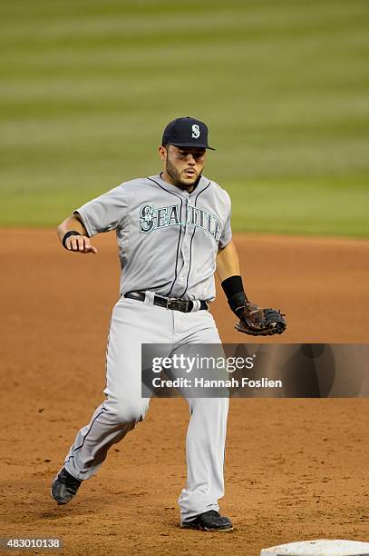 Jesus Montero of the Seattle Mariners makes a play at first base against the Minnesota Twins during the game on July 31, 2015 at Target Field in...