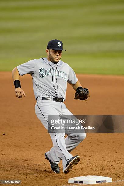 Jesus Montero of the Seattle Mariners makes a play at first base against the Minnesota Twins during the game on July 31, 2015 at Target Field in...