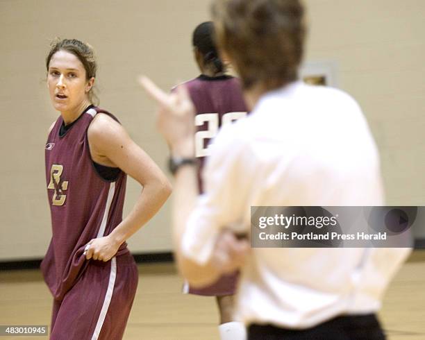 Staff Photo by Derek Davis, Friday, March 11, 2005: Boston College sophmore Sarah Marshall listens to head coach Cathy Inglese during practice at...