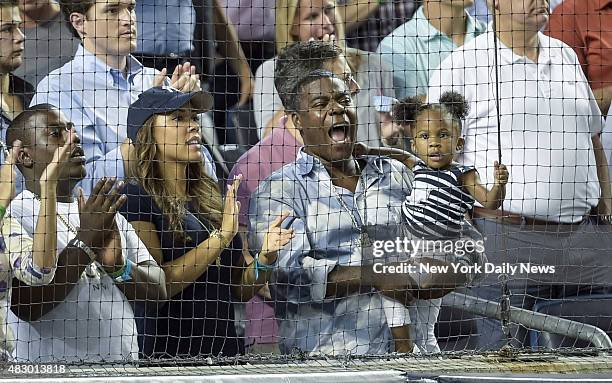 Comic Tracy Morgan, with fiancee Megan Wollover and their daughter Maven, has a blast as Yanks rout Red Sox 13-3 at The Stadium.