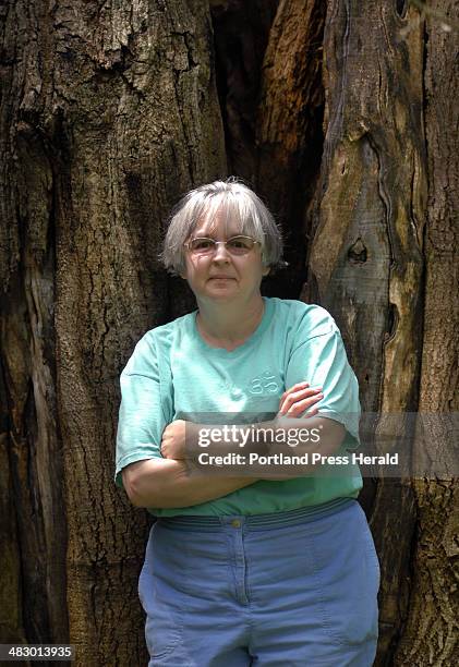 Shawn Patrick Ouellette, Friday, May 26, 2006: Author Tabitha King in front of an old Walnut tree at her home in Bangor.