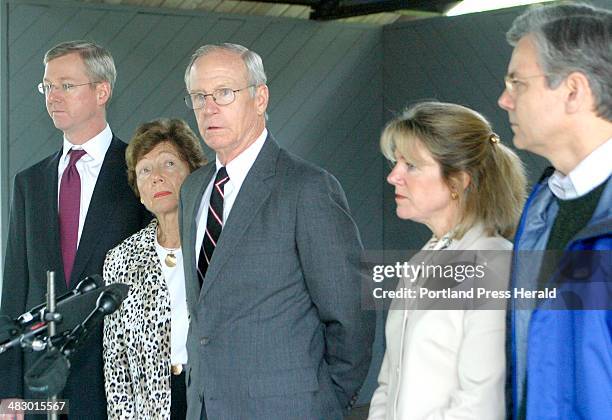Staff Photo by Herb Swanson, Saturday, May 22, 2004: Sam Cooley speaks to the media with his wife Trig and children John Pam and Charlie before a...