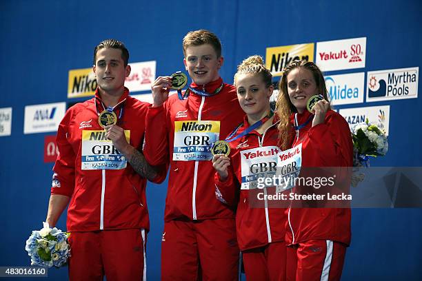 Gold medallists Chris Walker-Hebborn, Adam Peaty, Siobhan-Marie O'Connor and Fran Halsall of Great Britain pose during the medal ceremony for the...