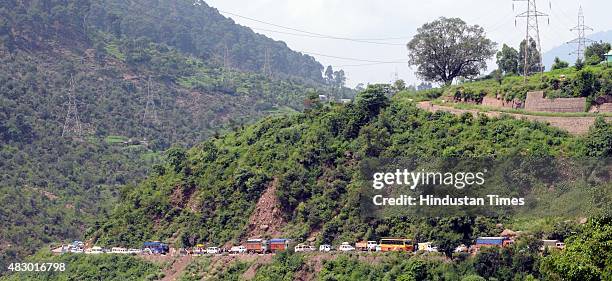 Vehicles stranded after the terrorist attack on BSF convoy at Jammu-Srinagar national highway on August 5, 2015 in Udhampur near Jammu, India. A...