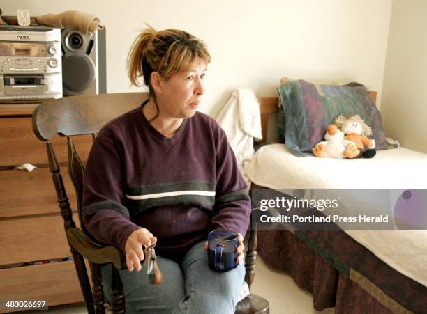 Staff Photo by Jill Brady, Thursday, April 20, 2006: Charlotte Gould has been a resident at Logan Place since it opened one year ago. *with Kelley...