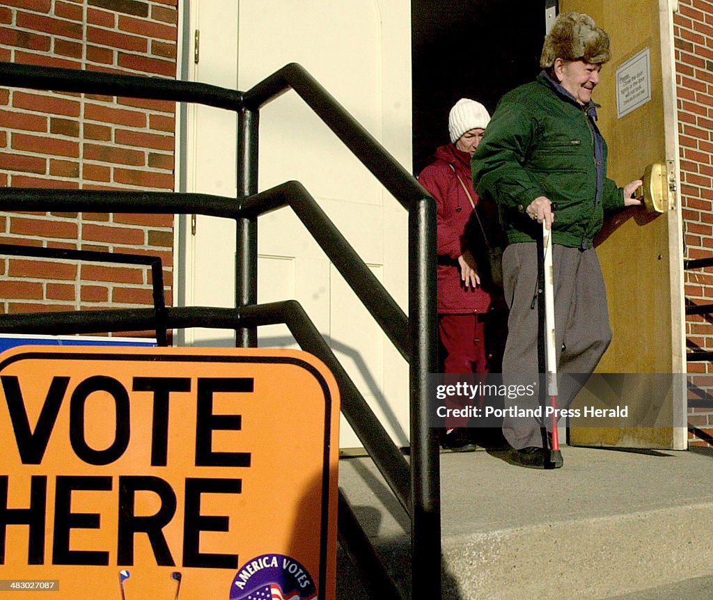 Al Moreau, 83, leaves Saint Mary's Hall in Dover, NH after voting for Howard Dean in the first in th...