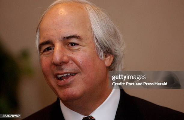 Staff Photo by Shawn Patrick Ouellette, Tuesday, April 13, 2004: Corporate fraud guru Frank Abagnale talks with people following his seminar at the...