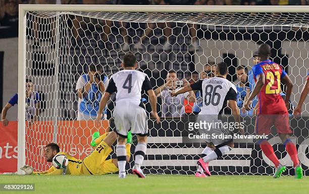 Goalkeeper Valentin Cojocaru of FC Steaua Bucharest saves a penalty kick taken by Valery Bozhinov of FC Partizan Belgrade during the UEFA Champions...