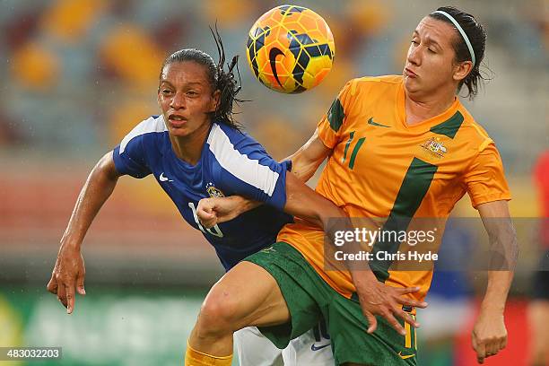 Rosana Augusto of Brazil and Lisa De Vanna of Australia compete for the ball during the Women's International Friendly match between the Australian...