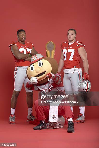 Season Preview: Portrait of Ohio State University linebacker Joshua Perry and defensive lineman Joey Bosa posing with mascot Brutus and National...