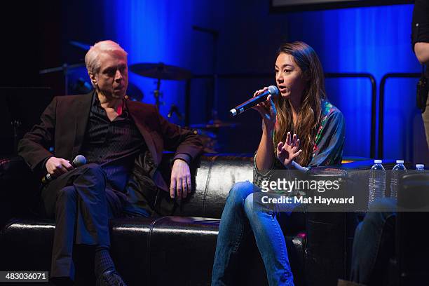 Songwriter, drummer, producer Bill Rieflin and musician Hollis Wong-Wear speak on stage during the Pacific Northwest Songwriter's Summit at...