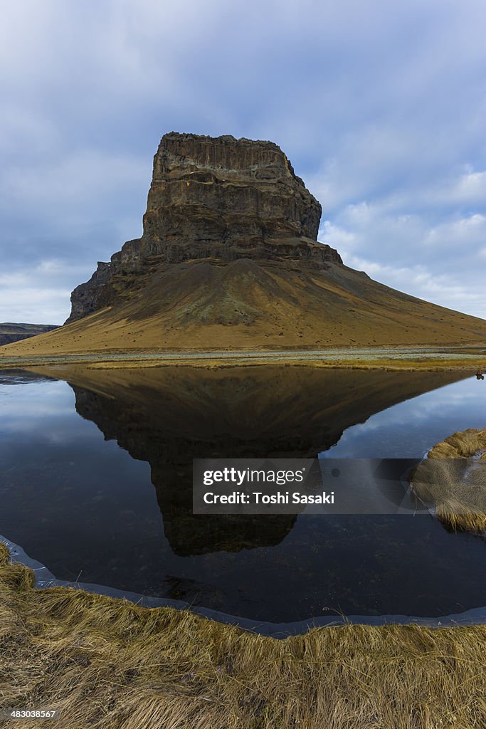 Rocky mountain reflected to lagoon, Iceland