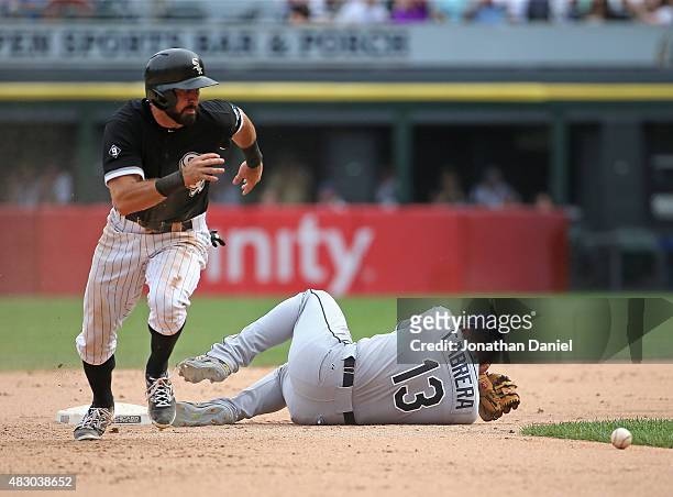 Adam Eaton of the Chicago White Sox moves to third base in the 10th inning after Asdrubal Cabrera of the Tampa Bay Rays is hit in the head with the...