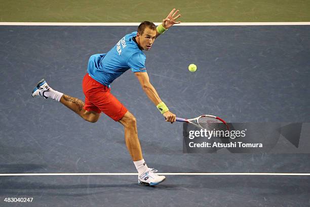 Lukas Rosol of the Czech Republic plays a backhand during his match against Yasutaka Uchiyama of Japan during day three of the Davis Cup World Group...