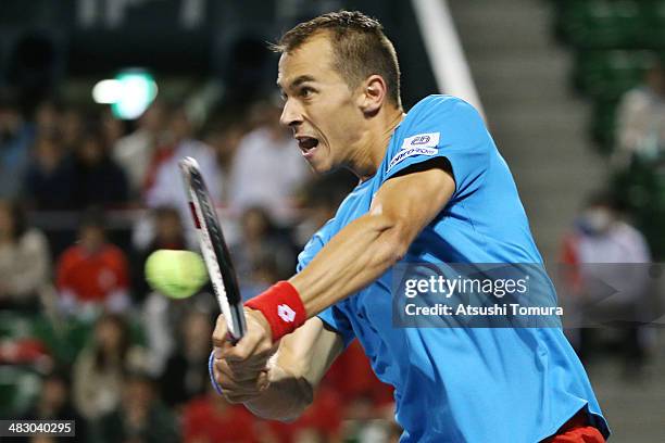 Lukas Rosol of the Czech Republic plays a backhand during his match against Yasutaka Uchiyama of Japan during day three of the Davis Cup World Group...