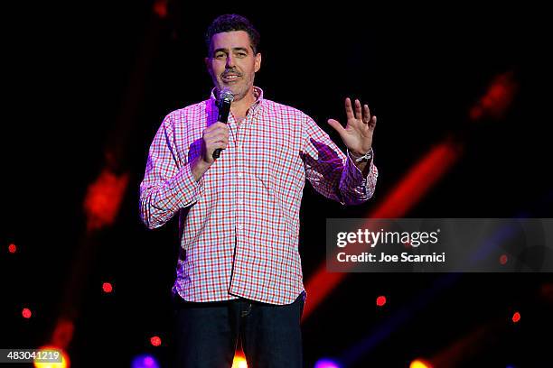 Adam Carolla performs onstage at the KROQ 106.7 FM Kevin & Bean's April Foolishness 2014 at The Shrine Auditorium on April 5, 2014 in Los Angeles,...