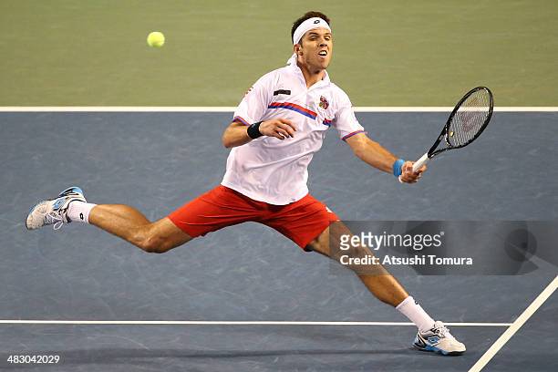 Jiri Vesely of the Czech Republic plays a forehand during his match against Taro Daniel of Japan during day three of the Davis Cup World Group...
