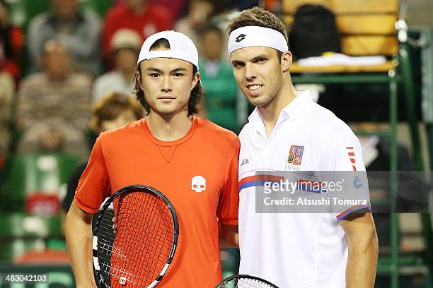 Taro Daniel of Japan and Jiri Vesely of the Czech Republic pose prior to their singles match during day three of the Davis Cup World Group Quarter...