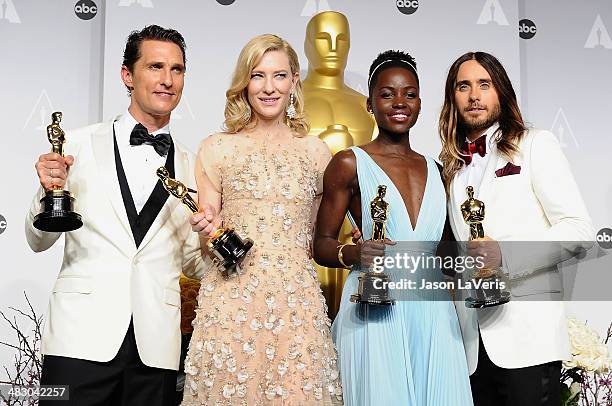 Matthew McConaughey, Cate Blanchett, Lupita Nyong'o and Jared Leto pose in the press room at the 86th annual Academy Awards at Dolby Theatre on March...