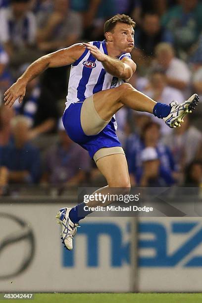 Brent Harvey of the Kangaroos kicks the winning goal during the round three AFL match between the North Melbourne Kangaroos and the Port Adelaide...