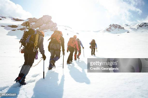 bergsteigen  - winter sport stock-fotos und bilder