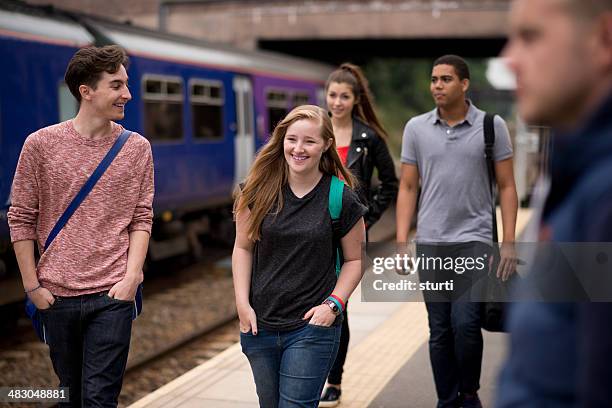 students taking the train - uk girl friends stock pictures, royalty-free photos & images