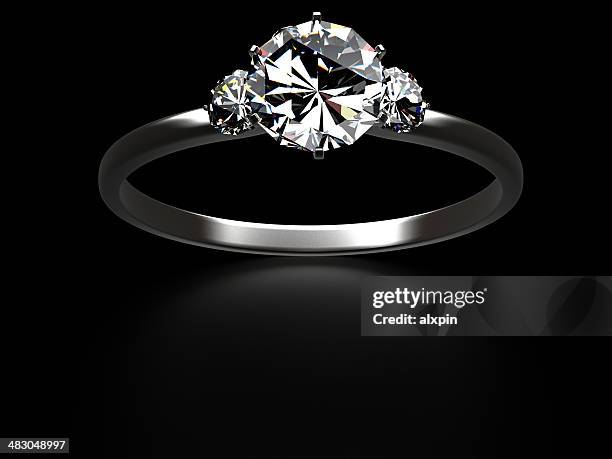 three stone rings on black - diamond ring stock pictures, royalty-free photos & images