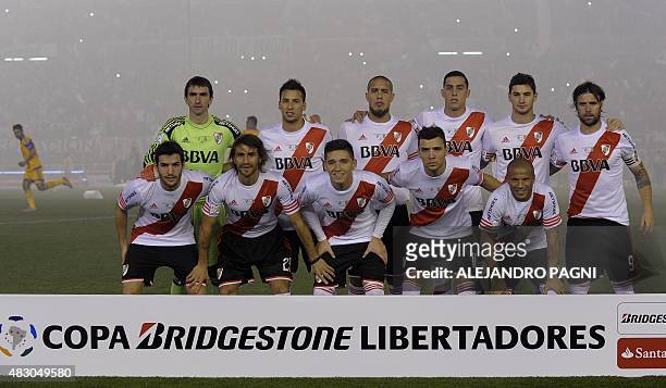 Argentina's River Plate team poses for a picture before their Libertadores Cup second leg final match against Mexico's Tigres, at Antonio Vespucio...