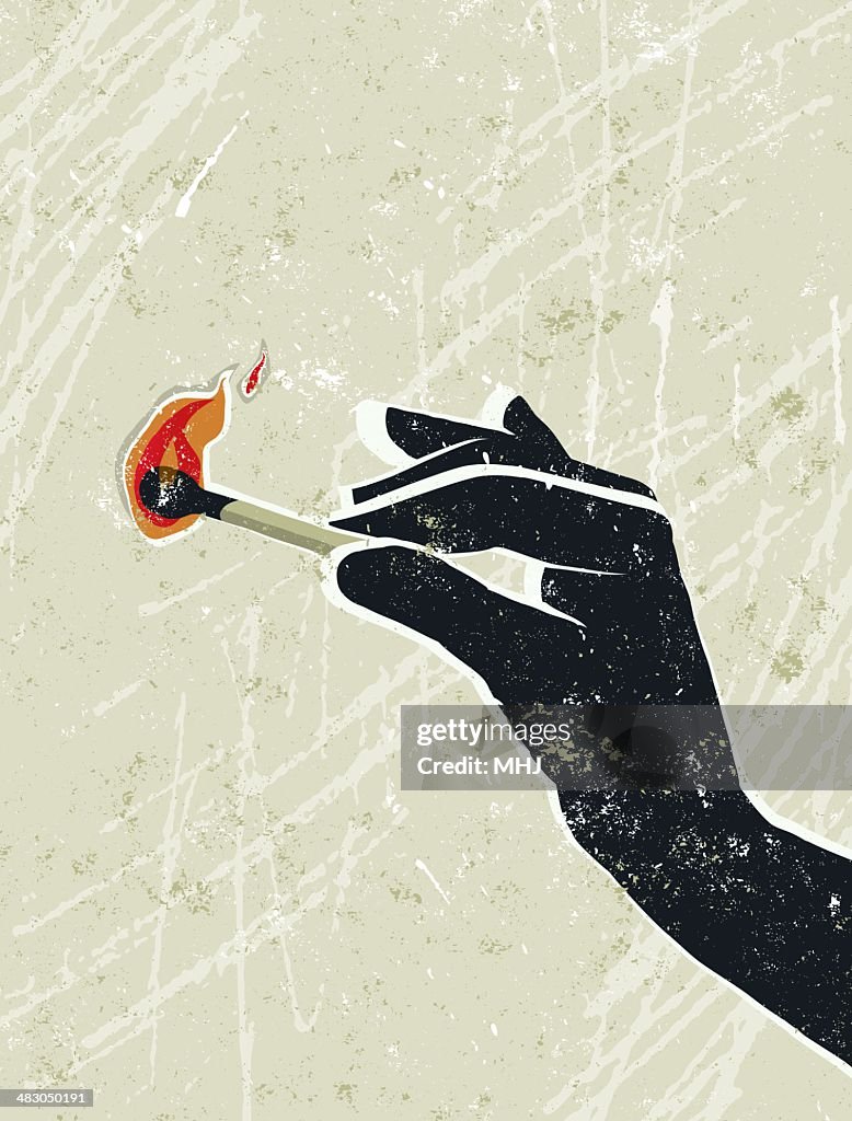 Main tenant un Match au feu