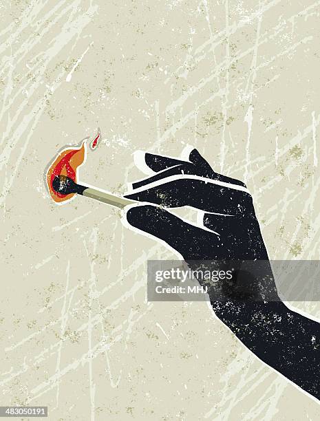 hand holding a burning match - silk screen stock illustrations