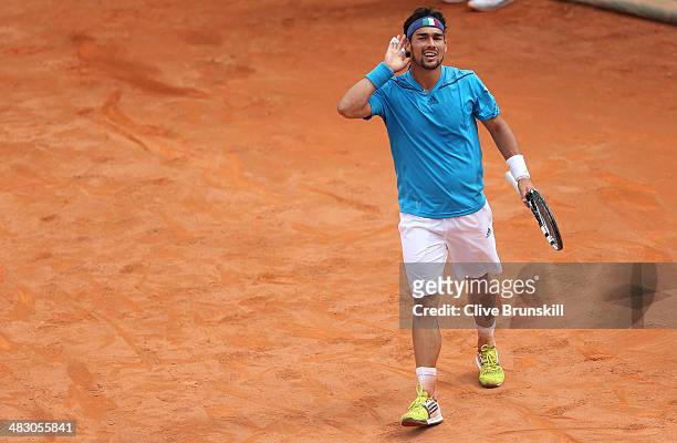 Fabio Fognini of Italy shakes celebrates match point after his straight sets victory against Andy Murray of Great Britain during day three of the...