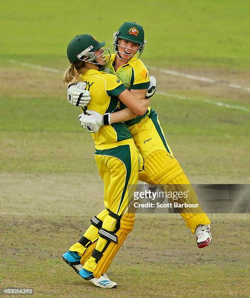 Ellyse Perry of Australia celebrates with Jess Cameron after hitting the winning runs to win the Final of the ICC Women's World Twenty20 Bangladesh...