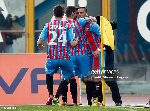 Gonzalo Bergessio of Catania celebrates after scoring the opening goal during the Serie A match between Calcio Catania and Torino FC at Stadio Angelo...