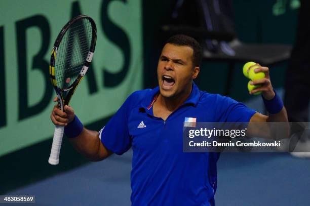 Jo-Wilfried Tsonga of France reacts during his match against Tobias Kamke of Germany during day 3 of the Davis Cup Quarter Final match between France...