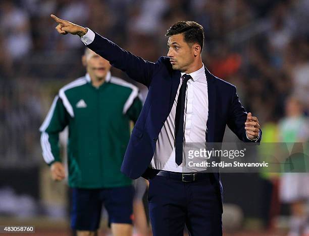 Coach Mirel Radoi gives instruction to the players during the UEFA Champions League Third Qualifying Round Second Leg match between FC Partizan...