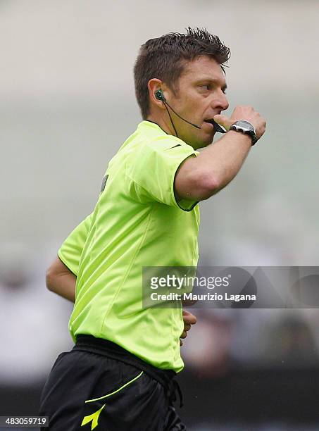 The referee Gianluca Rocchi blows his whistle during the Serie A match between Calcio Catania and Torino FC at Stadio Angelo Massimino on April 6,...