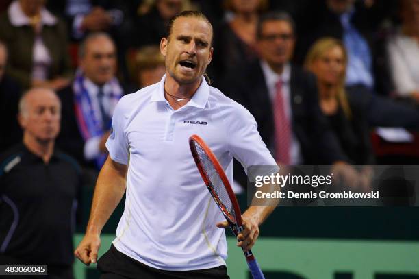 Peter Gojowczyk of Germany reacts during his match against Gael Monfils of France during day 3 of the Davis Cup Quarter Final match between France...